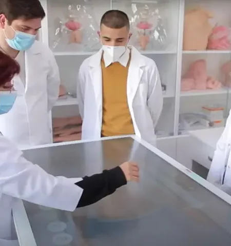 interactive table being used by medical students