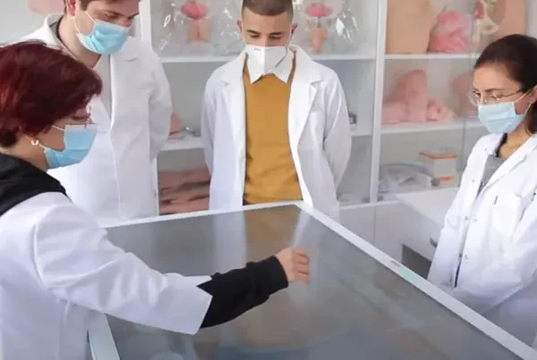 interactive table being used by medical students